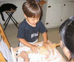 Art Baird's son, at age three, making pie crust from scratch.